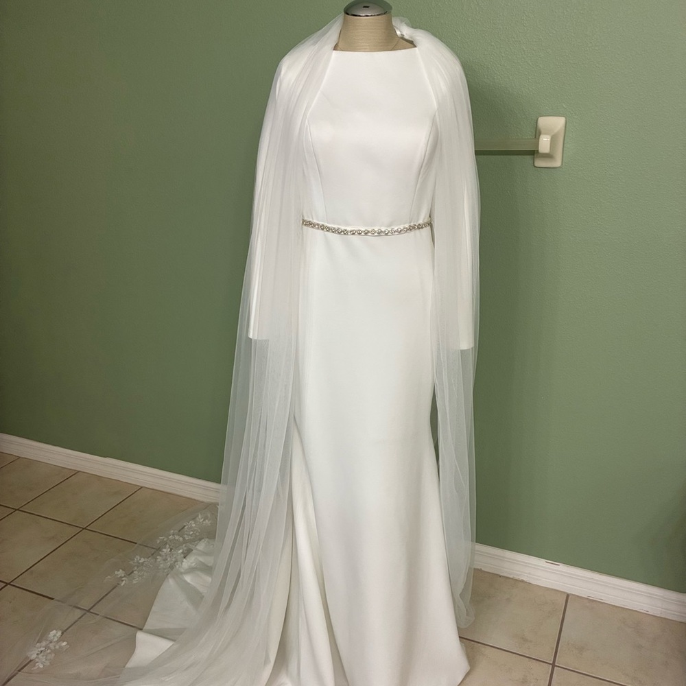 Sophisticated White Wedding Dress with Sheer Overlay